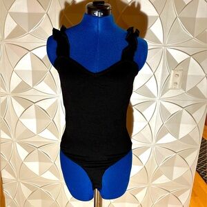 NWT. Francesca’s. Beverly knit ruffle bodysuit